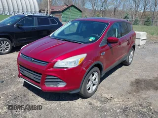 2013 Ford Escape SE with VIN 1FMCU9GX3DUB27683, listed as a IAAI auction lot 42068155 with 94,924 mi miles and . Bid and sale history available at DreamBid. Image 2.