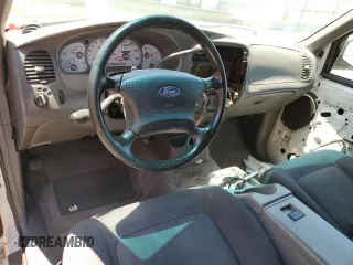 2001 Ford Explorer Sport z VIN 1FMYU60E41UA39699, wystawiony jako Copart lot #62336524 z przebiegiem 223 772 mil mil oraz Szkody całkowita. Historia ofert i sprzedaży dostępna na DreamBid. Obrazek 8.