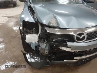 2012 Mazda CX-9 Touring z VIN JM3TB3CV8C0358099, wystawiony jako IAAI lot #41478110 z przebiegiem 151 716 mil mil oraz . Historia ofert i sprzedaży dostępna na DreamBid. Obrazek 6.