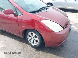 2005 Toyota Prius with VIN JTDKB20U957010252, listed as a IAAI auction lot 42119577 with 117,717 mi miles. Bid and sale history available at carsss.com. Image 6.