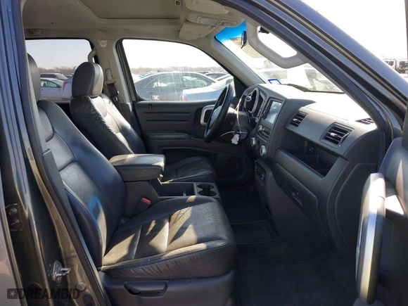2007 Honda Ridgeline RTL w/Leather with VIN 2HJYK16547H526249, listed as a IAAI auction lot 41769625 with 173,168 mi miles. Bid and sale history available at carsss.com. Image 5.