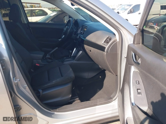 2013 Mazda CX-5 Touring with VIN JM3KE2CE3D0123138, listed as a IAAI auction lot 41818678 with 173,909 mi miles. Bid and sale history available at carsss.com. Image 5.