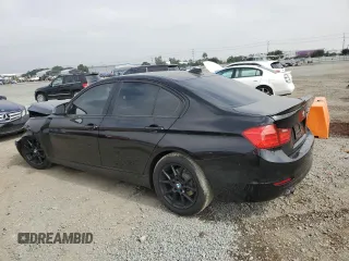 2013 BMW 3 Series 328i with VIN WBA3A5C53DJ461768, listed as a Copart auction lot 57687965 with 49,190 mi miles and Salvage title. Bid and sale history available at DreamBid. Image 2.