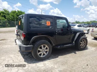 2011 Jeep Wrangler Sahara with VIN 1J4AA5D11BL528191, listed as a Copart auction lot 63252155 with 171,169 mi miles and Clean title. Bid and sale history available at DreamBid. Image 3.