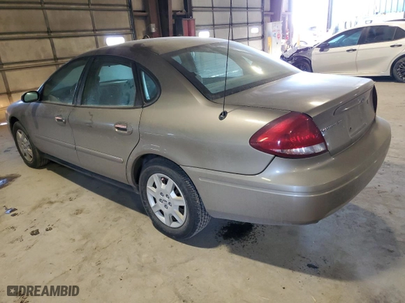 2006 Ford Taurus SE with VIN 1FAHP53236A241455, listed as a Copart auction lot 88879585 with 203,078 mi miles and Salvage Title. Bid and sale history available at carsss.com. Image 2.