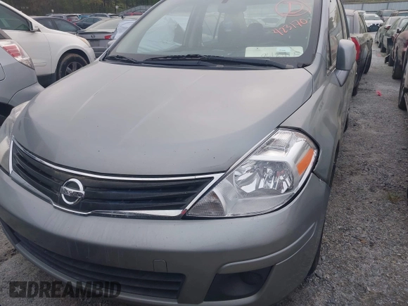 2011 Nissan Versa 1.8 S with VIN 3N1BC1AP9BL423170, listed as a IAAI auction lot 41821121 with 246,940 mi miles. Bid and sale history available at carsss.com. Image 6.