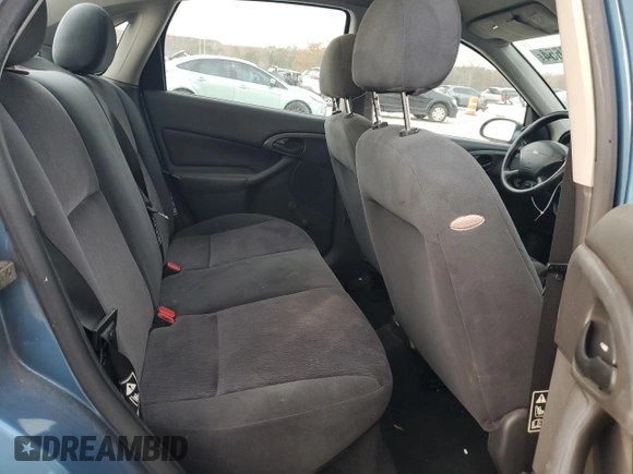 2001 Ford Focus LX with VIN 1FAHP33P01W332260, listed as a Copart auction lot 83221654 with 104,028 mi miles and Salvage Title. Bid and sale history available at DreamBid. Image 10.
