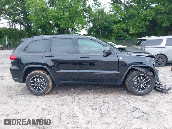 2020 Jeep Grand Cherokee Trailhawk with VIN 1C4RJFLG4LC387459, listed as a IAAI auction lot 42373820 with 55,492 mi miles and . Bid and sale history available at DreamBid. Image 13.