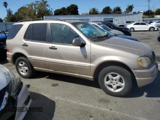 2001 Mercedes-Benz M-Class with VIN 4JGAB54E01A274839, listed as a Copart auction lot 72660884 with 190,934 mi miles and Clean Title. Bid and sale history available at carsss.com. Image 4.