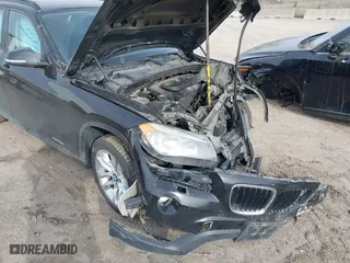 2015 BMW X1 xDrive28i with VIN WBAVL1C57FVY28954, listed as a IAAI auction lot 41857286 with 1 mi miles. Bid and sale history available at carsss.com. Image 13.