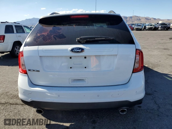 2014 Ford Edge SE z VIN 2FMDK3GC8EBB39954, wystawiony jako Copart lot #56427345 z przebiegiem 139 731 mil mil oraz Szkoda całkowita • Salvage title. Historia ofert i sprzedaży dostępna na DreamBid. Obrazek 6.
