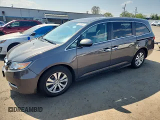 2014 Honda Odyssey EX-L with VIN 5FNRL5H63EB036388, listed as a Copart auction lot 65701425 with 117,636 mi miles and Clean title. Bid and sale history available at DreamBid. Image 1.