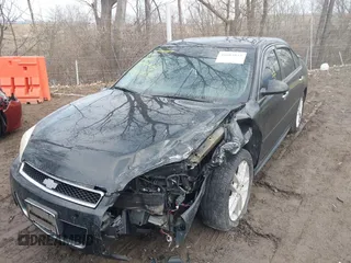 2013 Chevrolet Impala LTZ with VIN 2G1WC5E37D1197771, listed as a IAAI auction lot 41683854 with 119,321 mi miles and . Bid and sale history available at DreamBid. Image 17.