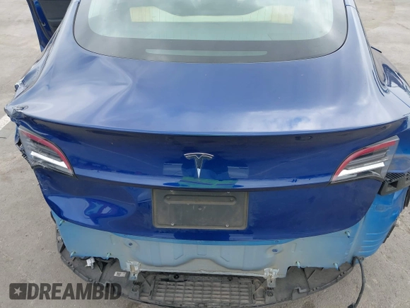 2020 Tesla Model 3 Standard Range Plus z VIN 5YJ3E1EA7LF705809, wystawiony jako IAAI lot #42146416 z przebiegiem 52 056 mil mil oraz . Historia ofert i sprzedaży dostępna na DreamBid. Obrazek 6.