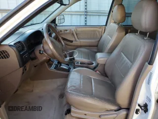 2000 Isuzu Rodeo S z VIN 4S2CK58W8Y4340907, wystawiony jako Copart lot #79683804 z przebiegiem 153 419 mil mil oraz Szkoda całkowita • Salvage title. Historia ofert i sprzedaży dostępna na DreamBid. Obrazek 7.