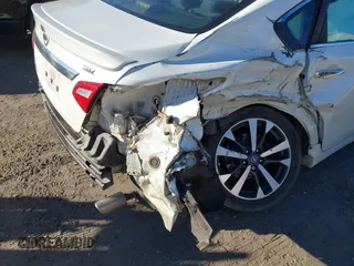 2016 Nissan Altima S z VIN 1N4AL3APXGC130780, wystawiony jako IAAI lot #41461581 z przebiegiem 92 043 mil mil oraz . Historia ofert i sprzedaży dostępna na DreamBid. Obrazek 6.