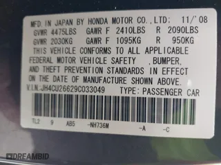 2009 Acura TSX with VIN JH4CU26629C033049, listed as a IAAI auction lot 41969918 with 122,772 mi miles. Bid and sale history available at carsss.com. Image 9.