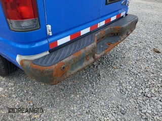 2012 Ford Econoline Cargo Commercial with VIN 1FTNE2EL1CDB21042, listed as a IAAI auction lot 42679263 with 90,458 mi miles and . Bid and sale history available at DreamBid. Image 32.