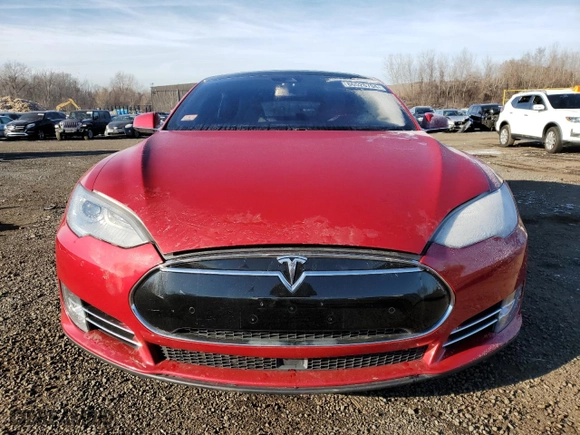 2015 Tesla Model S 85D with VIN 5YJSA4H2XFFP64919, listed as a Copart auction lot 86526704 with 129381 miles and Clean Title. Bid and sale history available at carsss.com. Image 5.