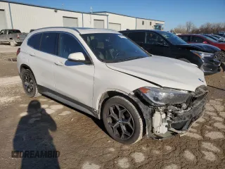 2018 BMW X1 xDrive28i with VIN WBXHT3C39J5L29286, listed as a Copart auction lot 82979384 with 108,250 mi miles and Salvage Title. Bid and sale history available at carsss.com. Image 4.