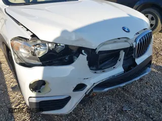 2018 BMW X1 sDrive28i with VIN WBXHU7C36J5H41267, listed as a IAAI auction lot 41270207 with 84,726 mi miles. Bid and sale history available at carsss.com. Image 6.