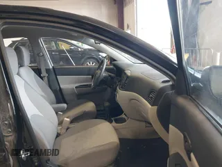 2011 Hyundai Accent GLS z VIN KMHCN4AC1BU620314, wystawiony jako IAAI lot #42228847 z przebiegiem 144 313 mil mil oraz . Historia ofert i sprzedaży dostępna na DreamBid. Obrazek 5.