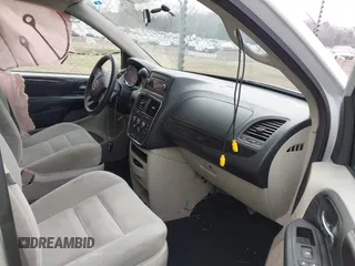 2014 Dodge Grand Caravan American Value with VIN 2C4RDGBG6ER380568, listed as a IAAI auction lot 41683180 with 303,612 mi miles and . Bid and sale history available at DreamBid. Image 5.