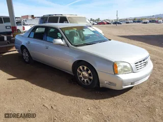 2003 Cadillac DeVille DTS with VIN 1G6KF57923U260229, listed as a IAAI auction lot 41415468 with 58,012 mi miles. Bid and sale history available at carsss.com. Image 1.