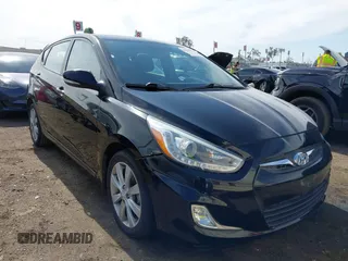 2014 Hyundai Accent SE with VIN KMHCU5AE6EU155785, listed as a IAAI auction lot 41589272 with 82,157 mi miles. Bid and sale history available at carsss.com. Image 1.