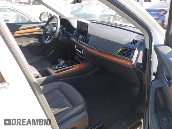 2022 Audi Q5 S line Premium Plus with VIN WA1EAAFY9N2112369, listed as a IAAI auction lot 42085322 with 58,303 mi miles and . Bid and sale history available at DreamBid. Image 5.