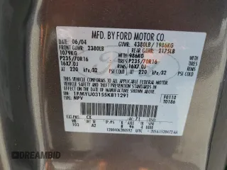 2005 Ford Escape XLT z VIN 1FMYU03155KB11291, wystawiony jako Copart lot #52246495 z przebiegiem Nie podano mil oraz Szkoda całkowita • Salvage title. Historia ofert i sprzedaży dostępna na DreamBid. Obrazek 12.
