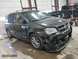 2014 Dodge Grand Caravan American Value Pkg with VIN 2C4RDGBG0ER203188, listed as a IAAI auction lot 41546560 with 182,421 mi miles. Bid and sale history available at carsss.com. Image 1.