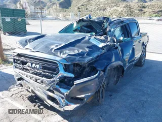 2019 Ram 1500 Limited with VIN 1C6SRFHT8KN839939, listed as a IAAI auction lot 42225074 with Not provided miles and . Bid and sale history available at DreamBid. Image 2.
