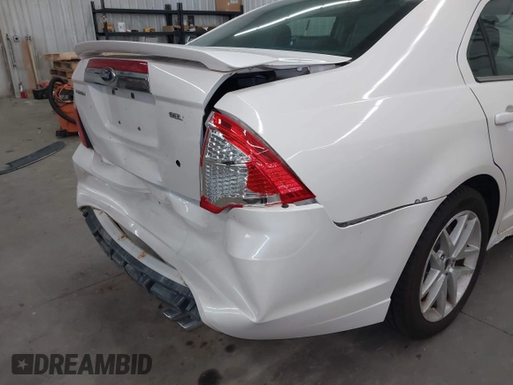 2012 Ford Fusion SEL z VIN 3FAHP0JAXCR104902, wystawiony jako IAAI lot #42471136 z przebiegiem 186 468 mil mil oraz . Historia ofert i sprzedaży dostępna na DreamBid. Obrazek 6.
