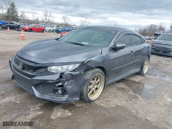 2019 Honda Civic Si Sedan with VIN 2HGFC1E59KH703592, listed as a IAAI auction lot 38735418 with 103,791 mi miles. Bid and sale history available at carsss.com. Image 2.