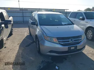 2012 Honda Odyssey LX with VIN 5FNRL5H28CB019838, listed as a IAAI auction lot 41844803 with 179,454 mi miles and . Bid and sale history available at carsss.com. Image 1.