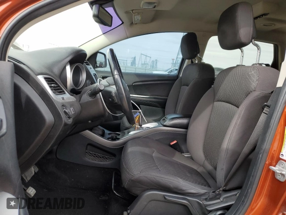2013 Dodge Journey SXT with VIN 3C4PDCBG9DT710666, listed as a Copart auction lot 86851234 with 165,171 mi miles and Salvage title. Bid and sale history available at DreamBid. Image 7.