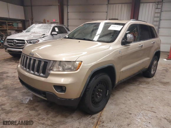 2011 Jeep Grand Cherokee Limited with VIN 1J4RR5GTXBC562817, listed as a IAAI auction lot 41817077 with 165,139 mi miles. Bid and sale history available at carsss.com. Image 17.