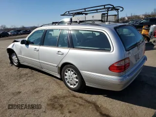 2001 Mercedes-Benz E-Class AWD with VIN WDBJH82J11X056425, listed as a Copart auction lot 48612975 with 130,900 mi miles and Salvage Title. Bid and sale history available at carsss.com. Image 2.