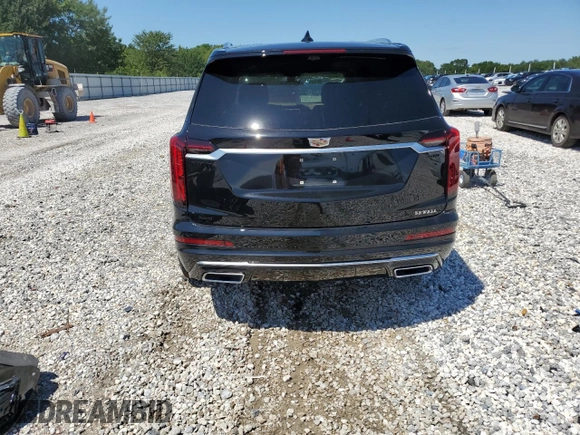 2023 Cadillac XT6 AWD Premium Luxury z VIN 1GYKPFRS2PZ162059, wystawiony jako Copart lot #63882963 z przebiegiem 6 567 mil mil oraz . Historia ofert i sprzedaży dostępna na DreamBid. Obrazek 6.