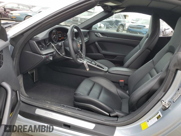 2020 Porsche 911 Carrera S z VIN WP0CB2A96LS263554, wystawiony jako Copart lot #52013384 z przebiegiem 8 702 mil mil oraz . Historia ofert i sprzedaży dostępna na DreamBid. Obrazek 7.