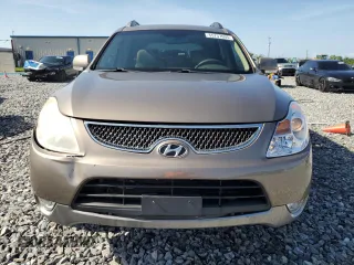 2010 Hyundai Veracruz Limited z VIN KM8NU4CC1AU121097, wystawiony jako Copart lot #55757695 z przebiegiem 130 673 mil mil oraz Szkoda całkowita • Salvage title. Historia ofert i sprzedaży dostępna na DreamBid. Obrazek 5.