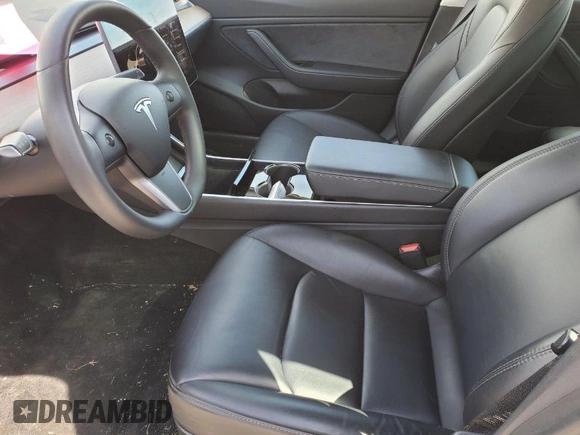 2020 Tesla Model 3 Long Range with VIN 5YJ3E1EB5LF649992, listed as a IAAI auction lot 41976570 with 77,235 mi miles and . Bid and sale history available at DreamBid. Image 1.