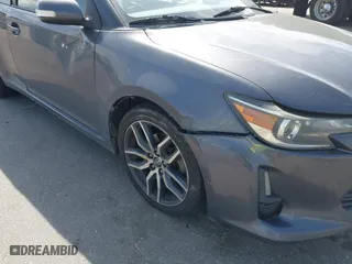 2015 Scion tC with VIN JTKJF5C71FJ013747, listed as a IAAI auction lot 42087740 with 138,097 mi miles. Bid and sale history available at carsss.com. Image 6.