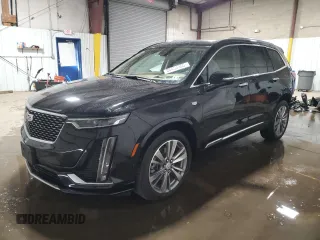 2022 Cadillac XT6 Premium Luxury with VIN 1GYKPFRS0NZ154930, listed as a Copart auction lot 88454595 with 26,334 mi miles and Salvage Title. Bid and sale history available at carsss.com. Image 1.