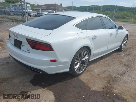 2016 Audi A7 Prestige with VIN WAU2GAFC4GN043343, listed as a IAAI auction lot 42380383 with 75,087 mi miles and . Bid and sale history available at DreamBid. Image 4.