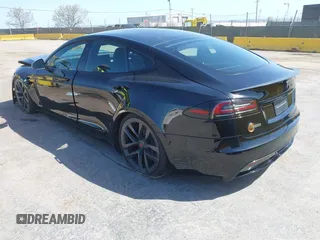 2022 Tesla Model S Plaid with VIN 5YJSA1E61NF483354, listed as a IAAI auction lot 41973636 with 32,541 mi miles and . Bid and sale history available at DreamBid. Image 3.