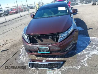 2013 Kia Optima LX z VIN 5XXGM4A7XDG241462, wystawiony jako IAAI lot #41774969 z przebiegiem 151 819 mil mil oraz . Historia ofert i sprzedaży dostępna na DreamBid. Obrazek 12.