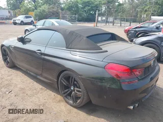 2014 BMW M6 z VIN WBSLZ9C5XEDZ78402, wystawiony jako IAAI lot #42399055 z przebiegiem 127 803 mil mil oraz . Historia ofert i sprzedaży dostępna na DreamBid. Obrazek 3.