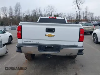 2018 Chevrolet Silverado 1500 LT with VIN 1GCUKREC0JF208509, listed as a IAAI auction lot 41794616 with 96,962 mi miles and . Bid and sale history available at DreamBid. Image 17.